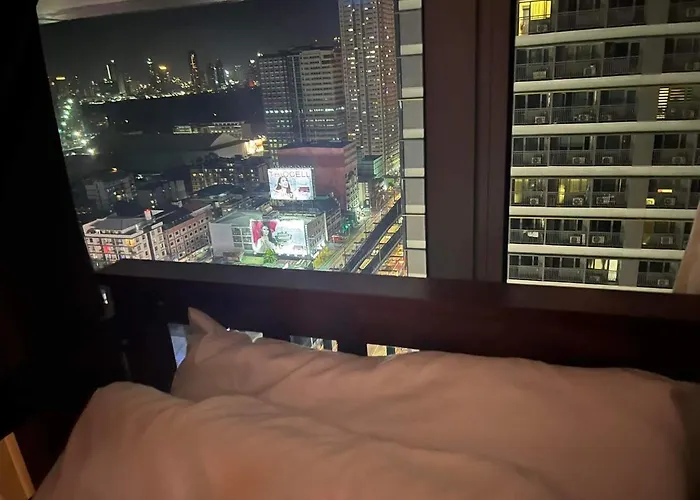 アパートホテル Cozy 1 Bedroom In Fame Residences Mandaluyong 3*
